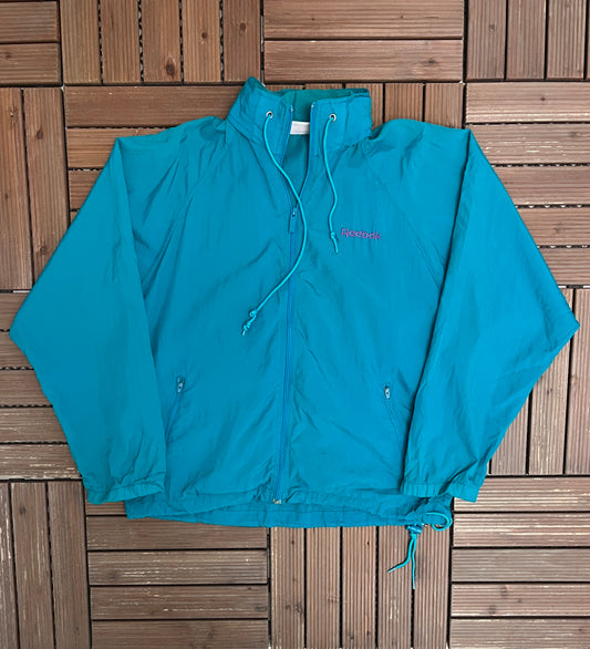 Reebok Embroidered Graphic Windbreaker | Size Medium | Vintage 1990s Reebok Branded Teal Jacket |