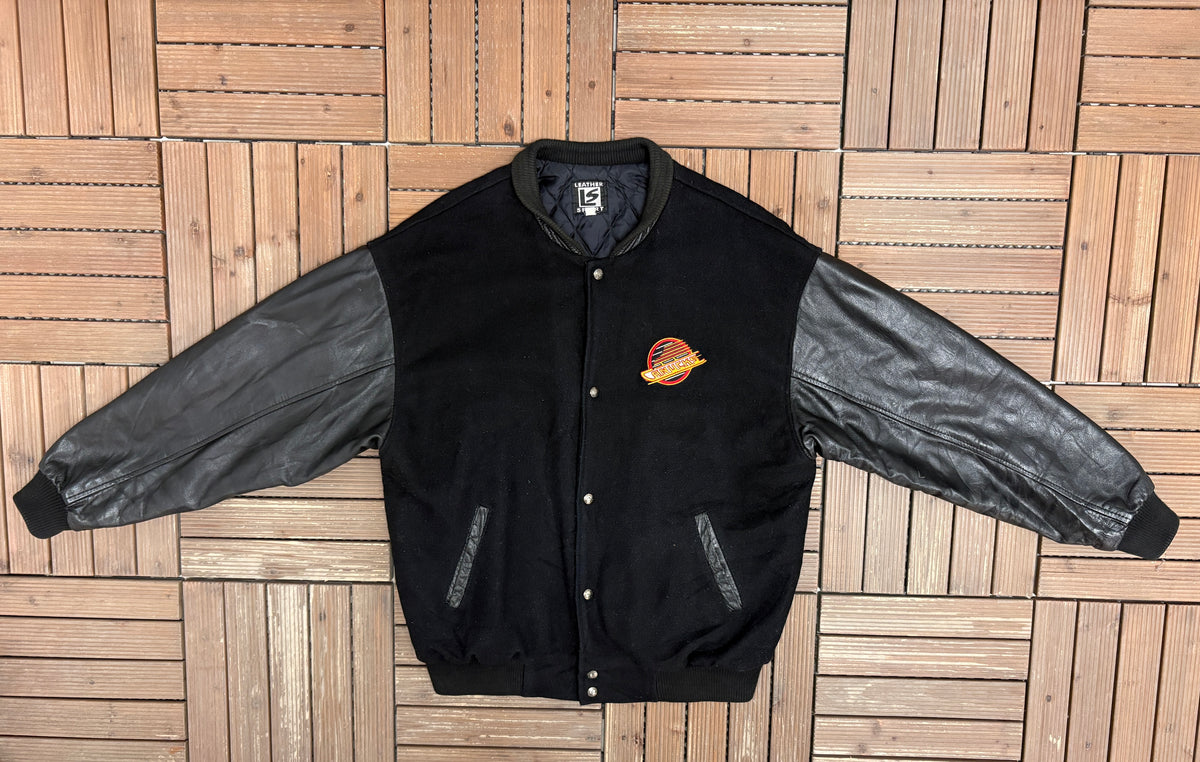 Vancouver Canucks Flying Skate Graphic Jacket | Size X-Large | Vintage 1990s NHL Hockey Black Jacket |