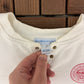 OshKosh All Goods Guaranteed First Class Graphic Crewneck | Size Large | Vintage 1990s Promotional White Sweater |