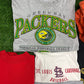 18 Piece Wholesale Bundle Lot of 1990s & 2000s Music, Pro / College Sports, Harley Davidson, Jeans, Promotional Items, Adidas Windbreaker